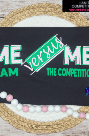 A black t-shirt with the words " me versus me i am the competition ".