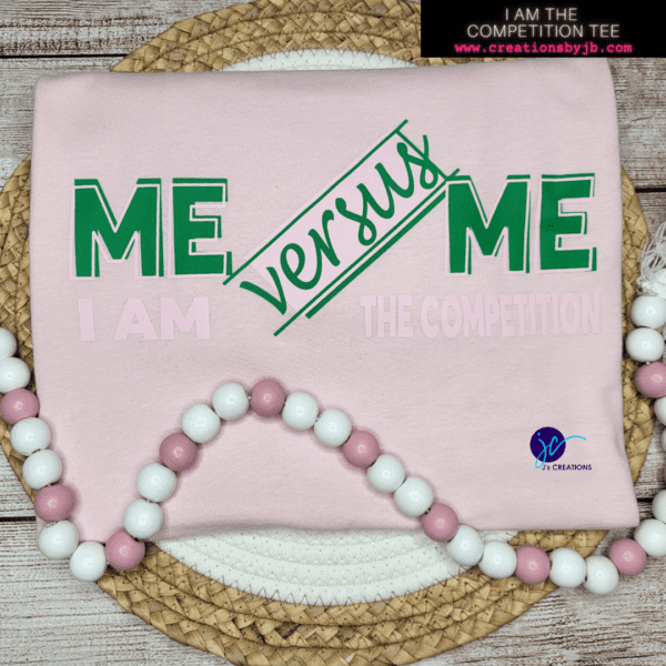 A pink plate with beads and a t shirt