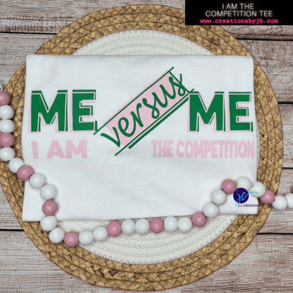 A white t-shirt with the words " me versus me ".
