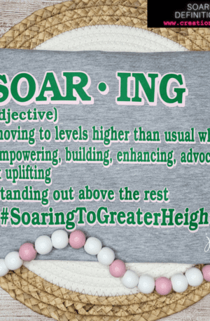 A t-shirt that says " soaring ".