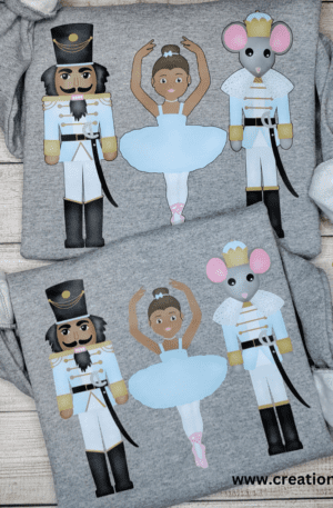 Two nutcracker shirts with a mouse and ballerina on them.