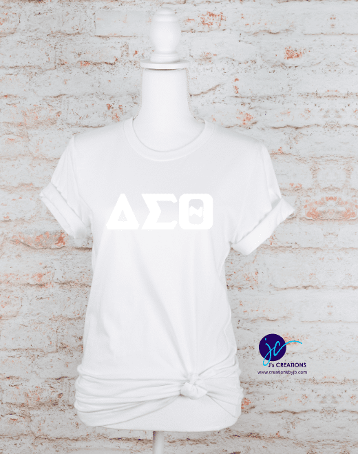 A white shirt with the letters delta sigma theta on it.