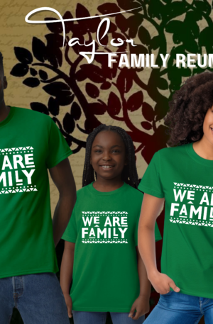 A family of three wearing green shirts.